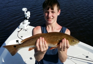 Gabe with a nice Redfish caught in Ormond Beach Florida 